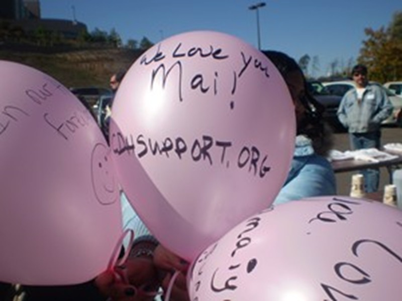 balloons we released in memory of Amaiya with the Cherubs website address