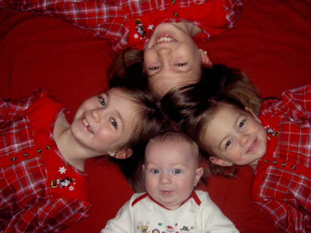 Dec. 2009 Jaxon and his big sisters